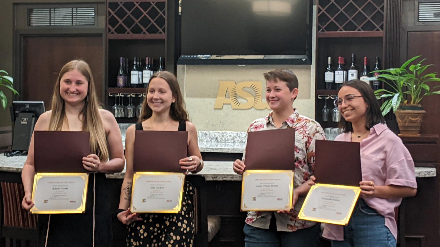 Four students who completed CIRTL certification