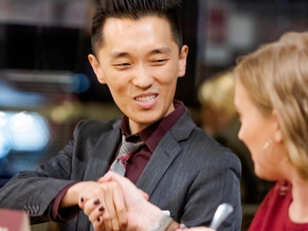 Two people shaking hands